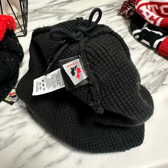 Nike- Team Canada Black and red winter hat with removable poof. - Picture 2 of 3